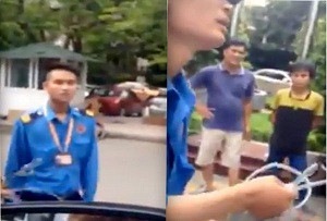 Ảnh cắt từ clip cho thấy các bảo vệ của BV Nhi Trung ương đang ngăn cản xe cứu thương ra khỏi BV.