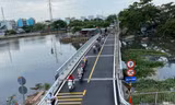 Cầu Phú Định thông xe trở lại, người dân thoát cảnh kẹt giờ cao điểm