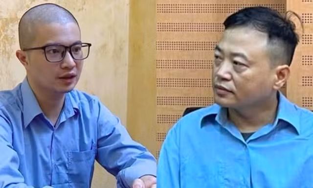 Hai bị can Phó Đức Nam và Shark Bình