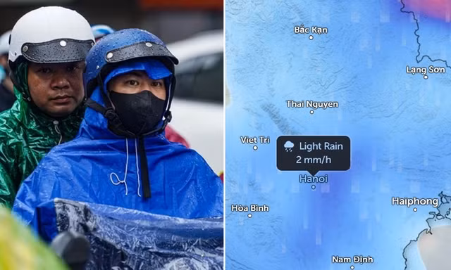 Người dân Hà Nội di chuyển dưới trời mưa trong đợt không khí lạnh.