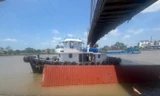 Phạt thuyền trưởng chở thùng container vướng dây điện cầu Chợ Gạo