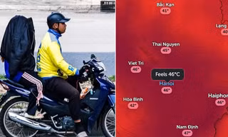 Người dân Hà Nội di chuyển dưới trời nắng nóng 