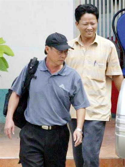 Ông Vinh tỏ ra bình thản hơn ông Toàn. Ảnh: Quốc An