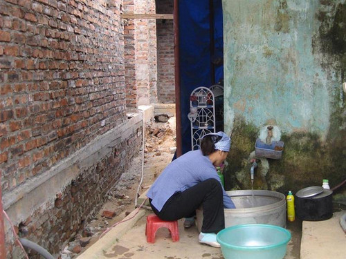 Chiếc chậu giặt khổng lồ - một sáng kiến tiết kiệm của ông Kim Ngọc