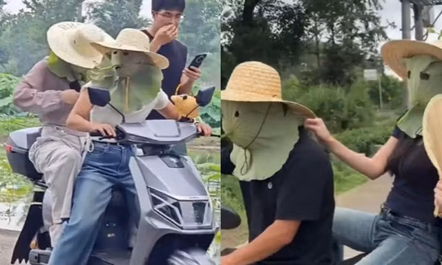 Trời nóng đỉnh điểm, giới trẻ tận dụng lá sen làm "phương tiện" chống nắng độc đáo