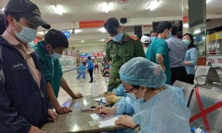 Xét nghiệm COVID-19 trên diện rộng tại TPHCM (ảnh: HCDC)