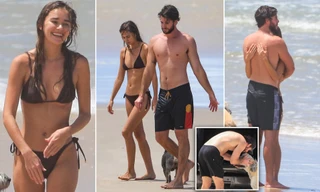 Liam Hemsworth tình tứ bạn gái người mẫu ở biển