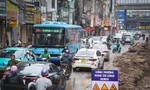 Sống chung với 'nắng bụi, mưa lầy' trên đường Nguyễn Tuân