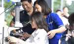 Học sinh tìm hiểu thông tin tại ngày hội tuyển sinh nhóm ngành khoa học công nghệ 2025 do báo Tiền Phong tổ chức Ảnh: DƯƠNG TRIỀU 