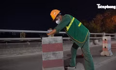Cầu Thanh Trì lắp dải phân cách cứng liên tục giữa hai làn xe