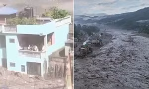 Ngôi nhà màu xanh đứng vững giữa khu vực bị lũ quét tàn phá ở Nepal