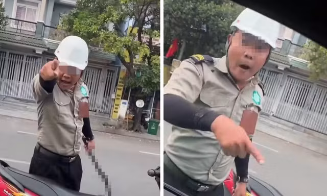 Hai người mặc đồ bảo vệ, cầm hung khí đe dọa tài xế tại TPHCM