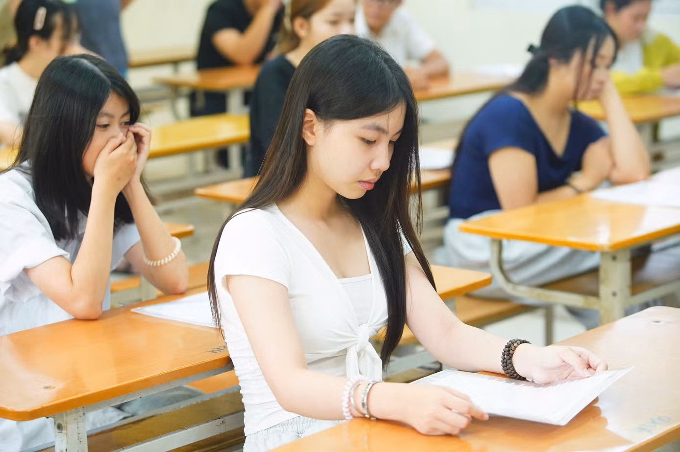 Thí sinh dự kỳ thi Tốt nghiệp THPT tại điểm thi THPT Yên Hòa (Hà Nội) (ảnh: Duy Phạm)