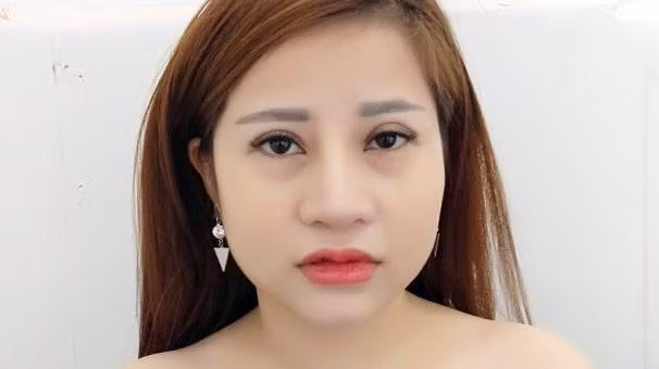 Quách Thị Thắm tại cơ quan công an.