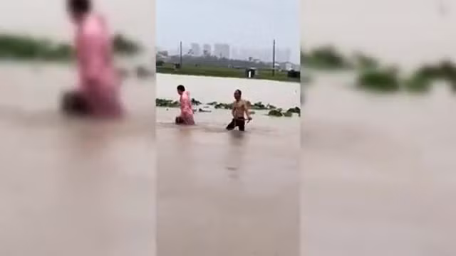 torrential-rains-bring-devastating-floods-to-a-chinese-city-and-a-snake-invasion-cnn.jpg
