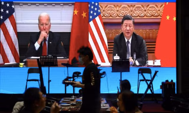 Tổng thống Mỹ Joe Biden (trái) và Chủ tịch Trung Quốc Tập Cận Bình. (Ảnh: Reuters)