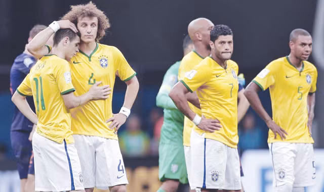 Brasil kết thúc trong thất vọng, Scolari vẫn chưa từ chức. Ảnh: AP/Getty Images
