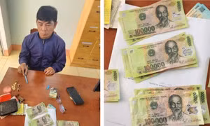 Lên facebook đặt mua tiền giả rồi mang ra chợ tiêu xài