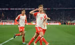 Kimmich ăn mừng sau khi ghi bàn vào lưới Arsenal.