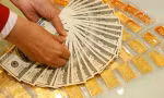 Giá vàng đồng loạt giảm, tỷ giá USD hạ nhiệt 