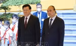 Chủ tịch nước Nguyễn Xuân Phúc chủ trì lễ đón Tổng Bí thư, Chủ tịch nước Lào