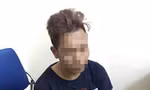 Nghi can H. bị đưa về trụ sở công an để tiếp tục làm rõ