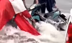 CLIP: Mưa như trút, nước chảy như thác cuốn trôi xe máy ở Bình Dương