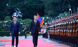 Thủ tướng Lào Saleumxay Kommasith chủ trì lễ đón Thủ tướng Lê Minh Hưng