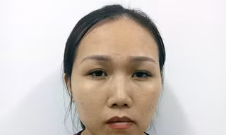 Nghi phạm Tuyền tại cơ quan công an
