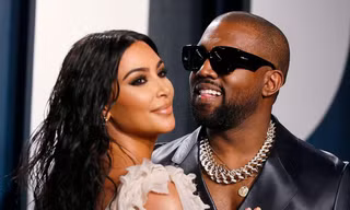 Vợ chồng Kanye West và Kim Kardashian - Ảnh: Reuters