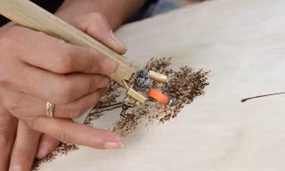 Độc đáo nghệ thuật viết thư pháp bằng bút lửa tại Hà Nội
