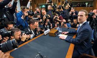 Mark Zuckerberg sau buổi điều trần trước Quốc hội Mỹ. Ảnh: EPA.