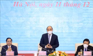 Chủ tịch nước Nguyễn Xuân Phúc chủ trì hội thảo. Ảnh TTX VN.