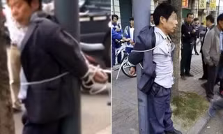 Cặp vợ chồng đánh đập, trói kẻ định quấy rối con gái vào cột đèn trước khi báo cảnh sát.