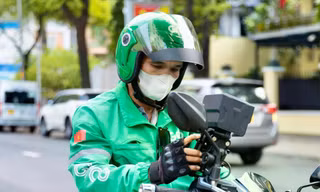 Lùm xùm phí Grab cao, cần siết lại ‘luật chơi’?