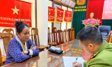 Bà Chu Thúy Nga tại cơ quan công an -Ảnh: H.T