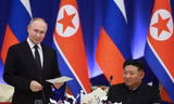 Tổng thống Nga Vladimir Putin và Chủ tịch Triều Tiên Kim Jong Un tại tiệc chiêu đãi ở Bình Nhưỡng ngày 19/6. (Ảnh: Sputnik)
