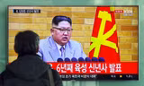 Một người ở Hàn Quốc xem bản tin về bài phát biểu năm mới của Kim Jong-un. Ảnh: AFP.
