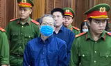 Bị cáo Nguyễn Minh Quân tại phiên tòa sáng nay 1/12.