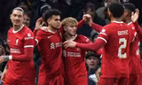 Các cầu thủ Liverpool ăn mừng.