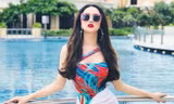 Hoa hậu Hương Giang 'đốt mắt' fans với bikini một mảnh
