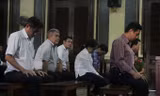 Các bị cáo tại phiên tòa ngày 21/8. Ảnh: Tân Châu.