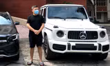 Nguyễn Minh Thành và siêu xe G63 tại cơ quan công an. Ảnh: Thanh Hà 
