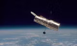 Kính viễn vọng Hubble đang bay trong vũ trụ ở chế độ an toàn sau sự cố máy tính khó hiểu.