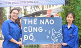 Tình nguyện viên Thủ đô sẵn sàng ô che, áo mưa đón thí sinh
