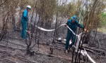 Kịp thời dập tắt cháy rừng ở giáp biên giới