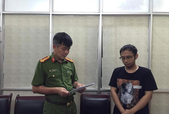 Ông Lê Thái Sơn khi bị tạm giữ.