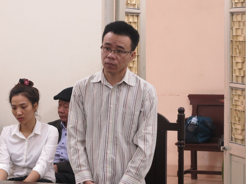 Nhâm Hoàng Nghĩa tại tòa.