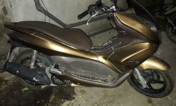 Chiếc xe máy tang vật của vụ án. Ảnh CQĐT
