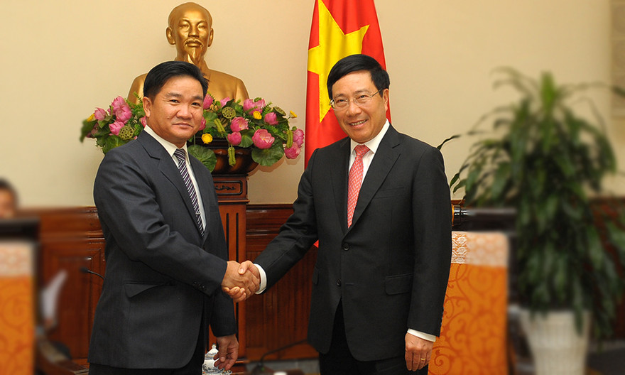 Uỷ viên Bộ Chính trị, Phó Thủ tướng Phạm Bình Minh tiếp đoàn đại biểu cấp cao T.Ư Đoàn TNNDCM Lào do Bí thư T.Ư Đoàn TNNDCM Lào Sỏn-Thạ-Nu-Thăm-Mạ-Vông dẫn đầu sang tham dự hoạt động tại Việt Nam (ảnh: Xuân Tùng)